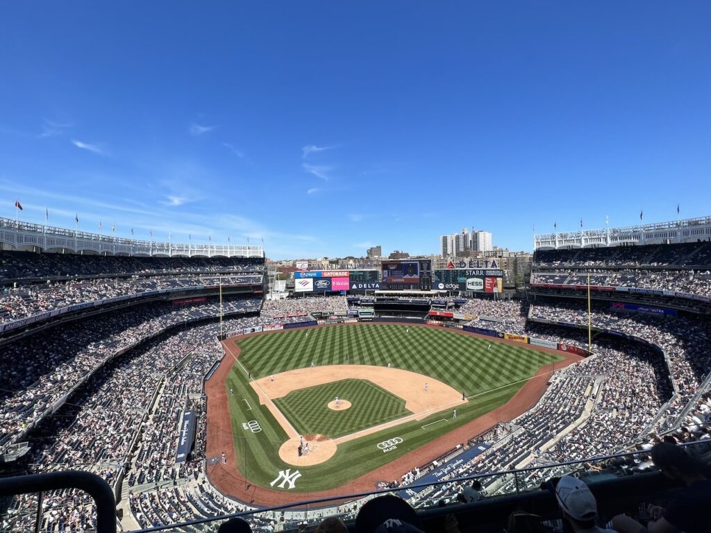 Two Yankees Baseball Players Standing Together On A Field Background,  Pictures Of The Yankees Background Image And Wallpaper for Free Download