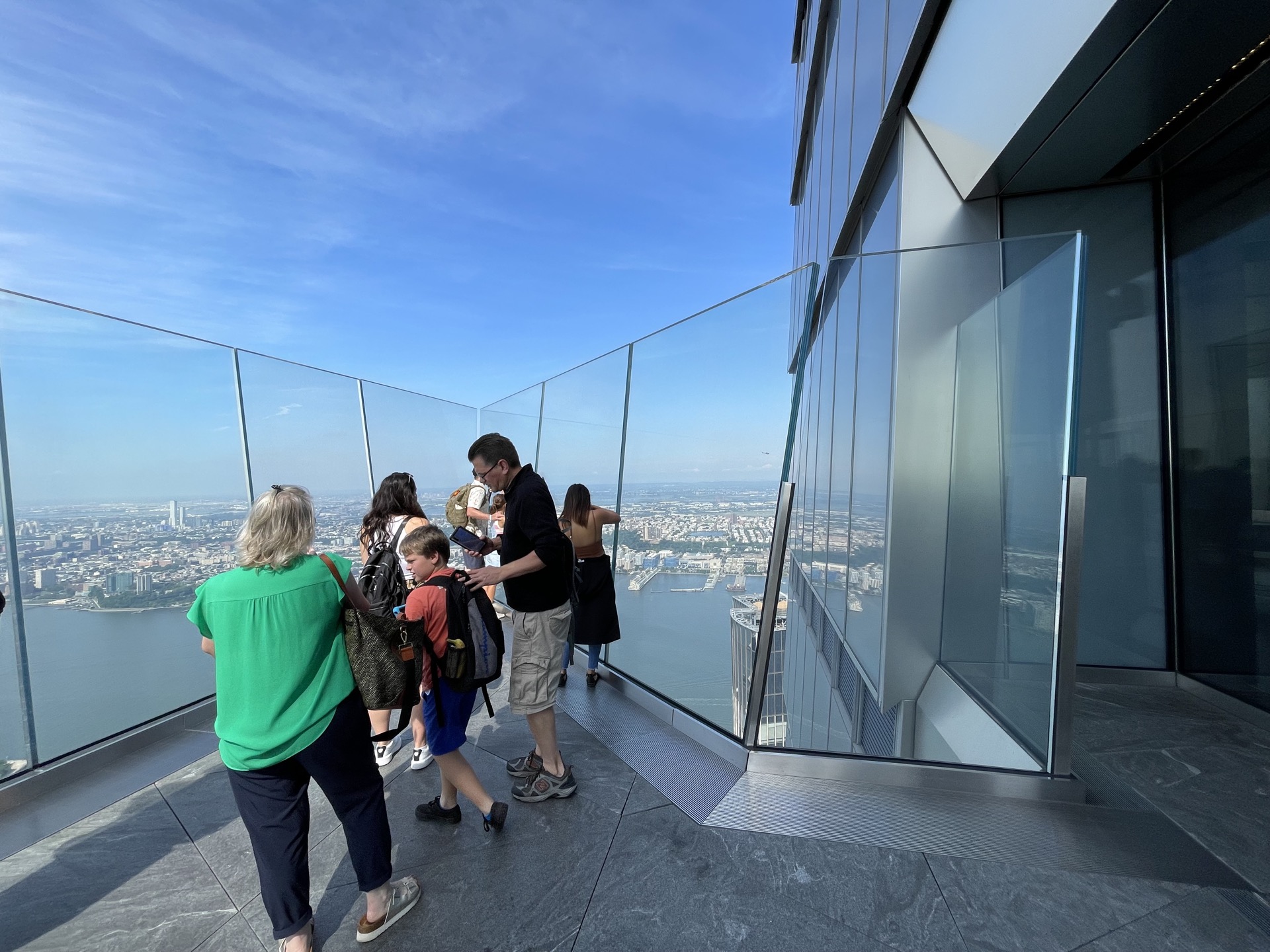 People taking pictures on the Edge observation deck